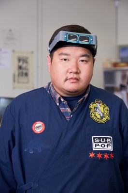A portrait of Library Of Congress conservation technician, Paul Kwan Asta, at work by DC-editorial photographer, Noah Willman. `