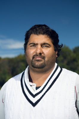 A portrait of a Washington Cricket League player during a match in Hyattsville, MD. Photo by DC based editorial photographer Noah Willman. `