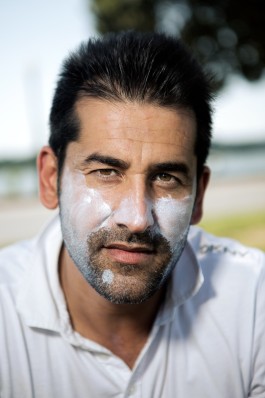 A close up portrait of a Washington Cricket League player at West Potomac Park in DC. Photo by Noah Willman. `